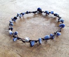 This is I handmade anklets made with sodalite stone chip beads woven together with cotton wax cord and with 8 mm stone for closure. Length :10 inches Blue Anklet, Wedding Anklets, Boys Bracelets, Handmade Anklets, Women Anklets, Beaded Anklets, Mens Leather Bracelet, Chip Beads, Anklet Jewelry