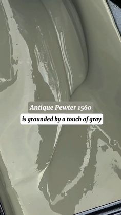 an antique pewer is grouted by a touch of gray text reads, antique pewer 156