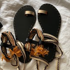 Never Worn Chic Strap Sandals For Beach, Orange Ankle Strap Sandals For Summer, Summer Orange Ankle Strap Sandals, Adjustable Ankle Strap Orange Sandals, Adjustable Ankle Strap Sandals In Orange, Orange Flat Sandals For Beach Season, Orange Summer Sandals For Beach Season, Orange Leather Sandals For Vacation, Chic Adjustable Sandals For Festival