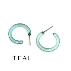 The Small Jelly Tube hoop earring is a skinny Tube Hoop & measures about 1" or 25mm in diameter & only 3.5mm in diameter. Super light weight & they go with anything. The look is modern, sleek, and minimalist or can be rocked with any retro inspired style as well. Some of the most versatile earrings we stock. Available in larger sizes as well, including... Large - 1.5" in Diameter XL - 2" in Diameter Bangle Hoop - 3" in Diameter Earrings are made with vintage lucite parts that were made in the US Trendy Small Hoop Hypoallergenic Earrings, Trendy Hypoallergenic Small Hoop Earrings, Trendy Small Adjustable Hoop Earrings, Trendy Small Hoop Earrings With Ear Wire, Trendy Adjustable Hoop Earrings, Trendy Small Hoop Clear Jewelry, Tube Hoop Earrings, Modern Small Blue Hoop Earrings, Blue Small Hoop Nickel-free Earrings