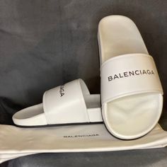 Women’s Balenciaga Slides. Size 41. Fits A 9.5/10 Women. Brand New. Box And Dust Bag Included. Classic White Slides With Round Toe, White Leather Slides For Spring, Modern White Round Toe Slides, Modern White Leather Slides, Luxury White Leather Slides, Designer White Leather Slides, Chic White Slip-on Slides, Luxury White Slip-on Slides, White Leather Slip-on Slides