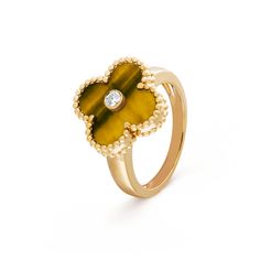 Van Cleef & Arpels - Vintage Alhambra ring - Ring Woman Yellow Gold/Diamond/Tiger's Eye - Faithful to the very first Alhambra® jewel created in 1968, the Vintage Alhambra creations by Van Cleef & Arpels are distinguished by their unique, timeless elegance. Inspired by the clover leaf, these icons of luck are adorned with a border of golden beads. Faithful to the very first Alhambra® jewel created in 1968, the Vintage Alhambra creations by Van Cleef & Arpels are distinguished by their unique, tim Alhambra Ring, Alhambra Pendant, Van Cleef And Arpels Jewelry, Gold Tiger, Clover Ring, Gold Tiger Eye, Eye Round, Van Cleef & Arpels, Golden Beads