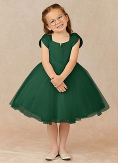 Let your flower girl be the whimsical princess she is while wearing our matte satin and tulle dress, Malinda. Her square neckline is framed with delicate pleated tulip sleeves that offer a wide range of motion. Her waist has a thin belt that sits atop an airy keen length tulle skirt. Dark Green Flower Girl Dresses, Dark Green Ball Gown, Whimsical Princess, Green Flower Girl Dresses, Black Flower Girl Dress, Green Ball Gown, Dark Green Wedding, White Flower Girl Dresses, Tulle Flower Girl