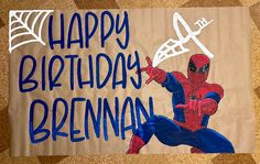 a spiderman birthday sign with the words happy birthday, breznan