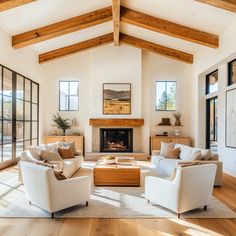 a living room filled with furniture and a fire place in the middle of a room