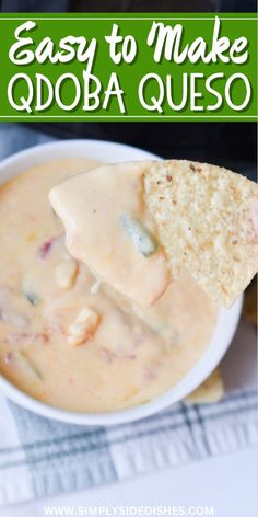 a tortilla chip being dipped into a bowl of quesadilla soup