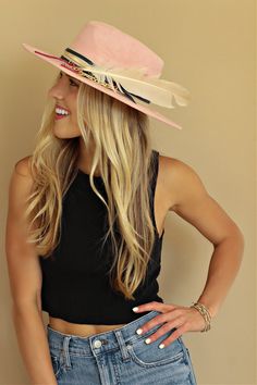 Our love of hats just got became a full-on obsession: meet the Navajo Feather Banded Hat in Grey. The most chic, high-end hat we could've ever dreamed up. A hat this good needs to be worn as much as possible and with every single outfit! Hand made by artisans, incredible quality, pure suede, genuine leather trim around the crown, authentic feathers, chain, too many details to list! The best part? It's super structured with an elastic band on the inside that will fit EVERYONE. Btw never taking th Bohemian Pink Hat Band For Kentucky Derby, Pink Hat For Kentucky Derby Festival, Short Brim Mini Hat For Kentucky Derby Rodeo, Mini Hats With Short Brim For Kentucky Derby Rodeo, Fedora Hats For Rodeo And Kentucky Derby, Fedora Costume Hats For Kentucky Derby And Rodeo, Summer Festival High Crown Hats, Fedora With Feather Trim For Rodeo, Feathered Hat Bands With Curved Brim For The Beach