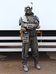 a man in a star wars outfit holding a radio