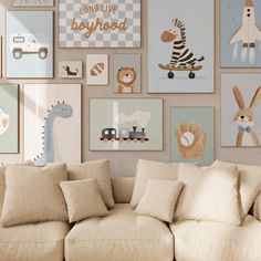 a living room filled with lots of pictures on the wall above a couch and pillows