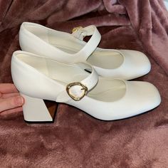 Gorgeous Never-Been-Worn Charles & Keith Mary Janes With 2.75” Chunky Heels. In Perfect Condition And Genuinely The Cutest Shoes I’ve Ever Tried On, But They Fit Way More Like A 10 Than Like An 11 Which They’re Listed As Online :’) Gold Buckles And Mirrored Gold Detail On The Front Of The Heels Formal White Heels With Buckle Closure, White Mary Jane Heels For Formal Occasions, White Heels With Buckle Closure For Office, White Mary Jane Heels Medium Width, White Mary Jane Heels With Buckle Closure, White Ankle Strap Heels For Office, Rocky Horror Picture Show Costume, White Mary Janes, Charles Keith Shoes