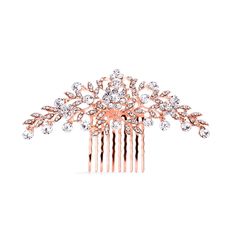 a rose gold comb with white and clear stones on it's side, in the shape of a flower