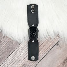 Perfect for those who love a simple natural look. Our natural leather is of the highest quality and softest material. Every piece cut from the leather is unique, with its own imperfections and natural marks. Each band is just as distinctive as our skin, unlike anyone else’s, and with its own story to tell. Bow Band Black leather lined with Black leather Embellishments and Adapters will be matched to Watch Color Approximately 1.5” wide Adjustable Snap Closure Leather Embellishments, The Chosen, Leather Band