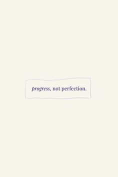 the words progress, not perfection written on a piece of paper