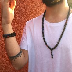 Mens Beaded Necklace, Black Lava Stone Boho Necklace, Tribal Jewelry, Ethnic Necklace, Gifts for Men, Mens Jewelry, Boyfriend Gift This stylish necklace is made of classy Lava rock stones and Hematite chip beads. The beads/stones in these bracelets are strung on high quality elastic stretch cord and the necklace is strung on high quality metal cord. Very light to wear, great for casual days as well as dressed-up events. This necklace and bracelet set is a perfect new piece or gift for a friend o Black Hand-strung Beaded Necklaces For Festivals, Hand-strung Black Beaded Necklaces For Festivals, Black Hand-strung Beaded Necklace For Festivals, Black 8mm Beads Jewelry For Festival, Festival Black Hand-strung Beaded Necklaces, Festival Hand-strung Black Beaded Necklaces, Casual Jewelry With 8mm Beads For Festivals, Casual 8mm Beads Jewelry For Festival, Black Bohemian Beaded Bracelets For Meditation