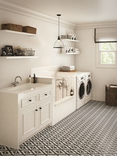 a washer and dryer in a white room with black and white checkered flooring