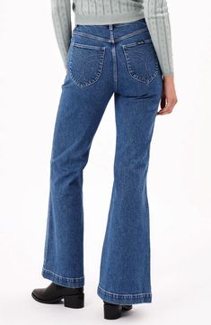 Front patch pockets and flared legs dial up the throwback charm of low-stretch flare jeans finished with a faded, vintage-inspired wash. 32" inseam; 25" leg opening; 11 1/2" front rise; 15 1/2" back rise (size 29) Zip fly with button closure Front patch pockets; back patch pockets 97% cotton, 2% polyester, 1% elastane Machine wash, line dry Imported Trendy Medium Wash Flares With Five Pockets, Faded Flare Jeans With Five Pockets, Medium Wash Mid-rise Flares With Five Pockets, Mid-rise Medium Wash Flares With Five Pockets, Retro High Rise Denim Blue Flares, Retro High Rise Medium Wash Flares, Retro High-rise Medium Wash Flares, Retro High Rise Denim Flares, Retro Medium Wash Flare Bottoms