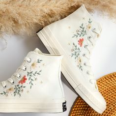 '' Custom Embroidered Wedding Converse, Bridal Flowers Embroidered Sneakers, Wedding Flowers Embroidered Shoes, Personalized Bridal Sneaker, Wedding Gift '' 🍀 Price includes Converse Shoes and Floral Embroidery Designs as shown 🍀 🍀 Shoe Type: Converse 1970s 🍀 Shoe color: 2. Invory_1970s 1. DETAILS 🍀 You can send me your Converse, Vans, canvas shoes or I can buy them for you. Custom-ordered embroidered Vans and Converse shoes, please wait another 2-4 days. Each pair is hand embroidered to order, please make sure you put in the correct shoe size before you check out. The embroidery is meticulous and does not fade. 🍀 You will receive Vans and Converse shoes with floral embroidery designs as above. 2. PERSONAL EXPRESSION 🍀 Create your unique vibe by your own design of embroidery! In add Sneaker Embroidery, Sneaker Wedding, Embroidery Sneakers, Embroidered Vans, Cute Converse Shoes, Embroidered Sneakers, Bridal Sneakers, Embroidered Converse, Cute Converse