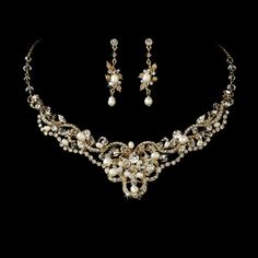 a necklace and earring set with pearls