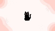 a black cat sitting on top of a pink floor next to a wall with leaves