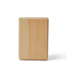 a square wooden object on a white background