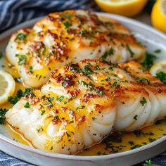 Discover how to make Lemon Butter Sautéed Cod, a simple yet elegant dish perfect for any occasion, with tips on cooking techniques. Ingredients Seafood • 4 Cod Produce • 2 cloves Garlic • 1 Lemon, Juice and zest of • 1 Lemon, slices • 2 tbsp Parsley, fresh Baking & Spices • 1 Salt and freshly ground black pepper Oils & Vinegars • 2 tbsp Olive oil Dairy • 4 tbsp Butter, unsalted  #dinnerideas #cookingathome #food #dinner #deliciousfood #homemade #eating #foodlover #nutrition #lunchtime #usa #newyork #homemade #breakfast #eat #dessert #pizza #foodblog Cod Fish Recipes, Fish Dinner Recipes, Cod Recipes, Fish Recipes Healthy, Fish Dinner, Two Fish, Lemon Butter, Seafood Dinner, Fish Dishes