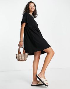 River Island frill tiered smock mini dress in black | ASOS Casual Mini Dress With Ruffles For Work, Casual Black Summer Tiered Dress, Chic Black Tiered Dress With Ruffles, Casual Black Tiered Summer Dress, Black Tiered Dress For Spring, Black Casual Tiered Dress With Ruffles, Black Tiered Dress With Ruffle Hem For Spring, Chic Mini-length Tiered Daywear Dress, Chic Mini Length Tiered Dress For Daywear