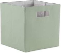 a light green storage box with a handle on the front and bottom, for storing items