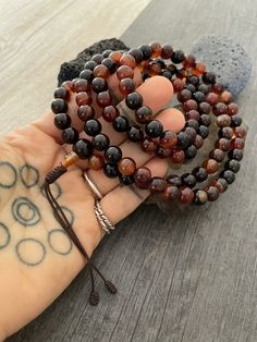 This Brown Agate Mala necklace has a brownish tone that will be easy to match your everyday outfits and keep you calm and grounded if you use it while meditating. Its a unique decor item also. A perfect gift for a yoga lover, or someone that loves stones. You can use it as a necklace or wrap it around the wrist and becomes a bracelet. The Mala necklace has a drop length of 42cm- 16.5 inch. A most have addition to your jewelry collection. ⚡️Join Akashi's VIP list for early bird discount access⚡️ Brown Gemstone Beads Bracelets For Meditation, Spiritual Brown Beaded Bracelets With Gemstone Beads, Spiritual Brown Gemstone Beaded Bracelets, Hand Wrapped Brown Beaded Bracelets For Meditation, Spiritual Healing Brown Beads, Amber Bead Necklace 8mm As Gift, Amber Necklaces With 8mm Beads For Gift, Amber Necklace With 8mm Beads For Gift, Brown Hand Wrapped Necklace For Healing