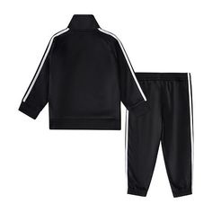 Perhaps the most comfortable and coordinated outfit ever dreamt up. This adidas two-piece jogger set for boys blends old-school tracksuit style with the outstanding feel of polyester tricot fabric. Easy to wear, easy to style, it's a proven winner that keeps on winning.# Pieces In Set: 21st Piece Description: Jacket1st Piece Pockets: 2 Side Slip Pocket(s)1st Piece Fabric: Tricot1st Piece Fiber Content: 100% Polyester1st Piece Care: Machine Wash, Tumble Dry2nd Piece Description: Pants2nd Piece Cl Adidas Sporty Tracksuit For Sports, Sporty Solid Cotton Sets, Adidas Long Sleeve Tracksuit, Adidas Long Sleeve Tracksuit Sportswear, Adidas Sportswear Tracksuit, Casual Long Sleeve Training Sets, Sporty Tracksuit With Letter Print For Sports, Adidas Sporty Long Sleeve Tracksuit, Sporty Cotton Sets With Ribbed Cuffs