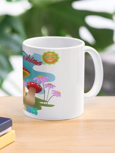 a white coffee mug sitting on top of a wooden table