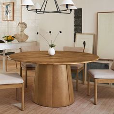 a dining room table with chairs around it