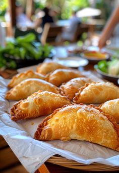 there are many pastries on the table ready to be eaten