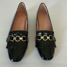 Black Patent Leather Loafers Size 7 New, Never Used Black Tassel Loafers For Office With Branded Insole, Elegant Black Almond Toe Moccasins, Elegant Black Tassel Loafers With Flat Heel, Black Patent Leather Loafers With Low Heel, Black Loafers For Spring Galas, Elegant Black Moccasins For Fall, Black Flat Moccasins For Office, Black Flat Tassel Loafers With Leather Sole, Black Flat Tassel Loafers For Office