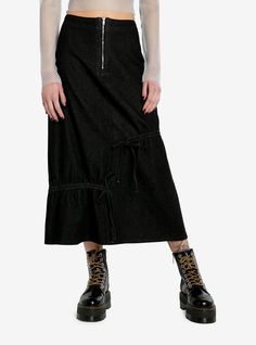 Somewhere between a midi skirt and a maxi skirt  we love a midaxi skirt for when we can't decide! This black denim midaxi style has a zipper at the front waist and ruching detail towards the bottom.100% cottonWash cold; dry lowLength: 33"ImportedListed in junior sizesModel is 5'10"Model wears size Small Black Cotton Midi-length Bottoms, Black Cotton Midi Bottoms, Black Ruched Maxi Skirt For Spring, Edgy Midi Skirt For Fall, Spring Skirt With Zipper Closure And Stretch, Spring Stretch Skirt With Zipper Closure, Ruched Skirt For Fall, Trendy Black Maxi Skirt For Fall, Spring Denim Skirt With Zipper Closure