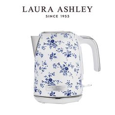 a blue and white flowered tea kettle with the words, laura ashley since 1953