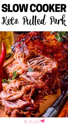 slow cooker veggie pulled pork on a cutting board with peppers and ketchup