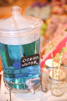 an ocean water container is sitting on a table