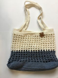 a crocheted bag sitting on top of a table