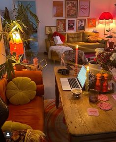 a living room filled with lots of furniture and decor