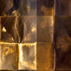 an abstract gold and black background with squares