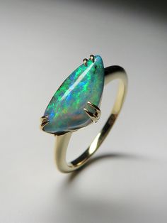 Boulder opal 14k gold ring  opal origin - Australia opal measurements - 0,16 х 0.24 х 0,51 in / 3 х 6 х 13 mm stone weight - 2,83 carat ring weight - 2.96 grams ring size - 7 US ref No 3967 Minimal collection LAYAWAY PAYMENT PLAN is available. We ship our jewelry worldwide - for our customers it is free of charge and fully insured (with tracking). To ensure that everything arrives securely and unharmed at the recipient, we only commission the established parcel service providers Deutsche Post, D Opal Gold Ring, Opal Ring Gold, Jewelry Beautiful, Bold Jewelry, Luxury Rings, 14k Gold Ring, Bracelet Collection, Australian Opal, Beautiful Ring