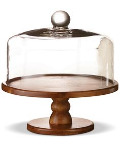 a wooden base with a glass cover on top