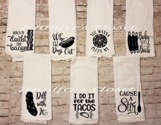 six kitchen towels hanging on a brick wall with the words i do it for the tacos