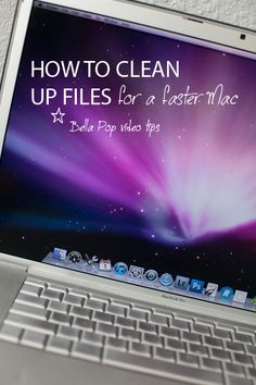 an open laptop computer sitting on top of a white wall with the words how to clean up files for a faster mac