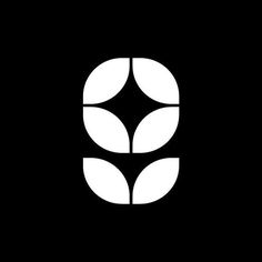 a black and white logo with three leaves in the shape of a letter o on a dark background