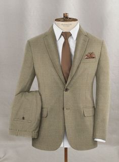 An essential for fashion-forward men, our finely casted Napolean Infantary Khaki Wool suit will give an instant makeover. Crafted from blend of wool,  our khaki suit lends the creation a timeless appeal. Dress up with this sumptuous outfit at weddings or parties and level up your dressing features. 
 
 Look Includes  Napolean Infantary Khaki Wool Fabric  Two Button Jacket Style  Notch Lapel  Horn Brown Buttons  Single Vent  Three Cuff Buttons  Two Welted Back Pockets on Trousers   
 140's Superf Classic Beige Business Suit, Classic Beige Three-piece Suit For Semi-formal Occasions, Formal Beige Tweed Jacket With Welt Pockets, Classic Beige Flat Front Suit, Classic Single-breasted Khaki Blazer, Khaki Business Blazer With Welt Pockets, Classic Beige Semi-formal Suits, Beige Business Suits With Welt Pockets, Classic Khaki Suits For Formal Occasions