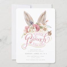 an easter card with bunny ears and flowers