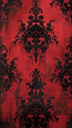 red and black wallpaper with an ornate design