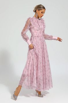 Elevate your style with the Beryl Pink Floral Long Sleeve Dress. Designed with a gentle breeze of femininity, this dress features a high-waisted cut and a Peter Pan collar adorned with delicate frills. Perfect for beach getaways or birthday celebrations, this long dress exudes a graceful charm that will turn heads wherever you go.  Dress Length: Approx 140cm Materials: Polyester Gentle Dry Clean Only  The model is 5 ft 7 and wears size S  Color may vary due to lighting on images. The product ima Elegant Maxi Ruffle Dress For Garden Party, Elegant Chiffon Ruffle Dress For Garden Party, Elegant Pink Maxi Dress With Ruffled Skirt, Feminine Chiffon Ruffle Dress, Feminine Chiffon Dress With Ruffled Skirt, Chiffon Midi Dress With Ruffles For Daywear, Chiffon Dress With Ruffled Skirt, Pink Long Sleeve Dress With Ruffled Skirt, Elegant Floral Print Maxi Ruffle Dress