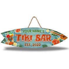 a wooden sign that says your name's tiki bar